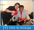 Mario & Smokin Joe Frazier Signing Gloves